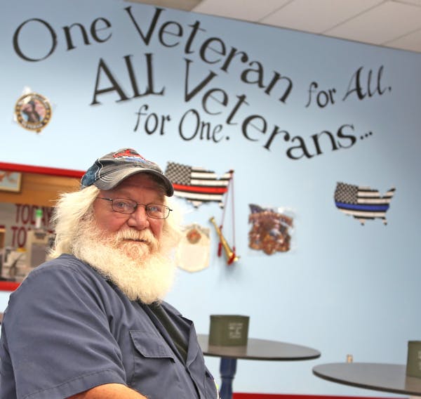 Steve Gallaspie of Arlington, Minn., soutwest of the Twin Cities, in the "Veteran's Mess Hall'' restaurant he plans to open once the coronavirus pande
