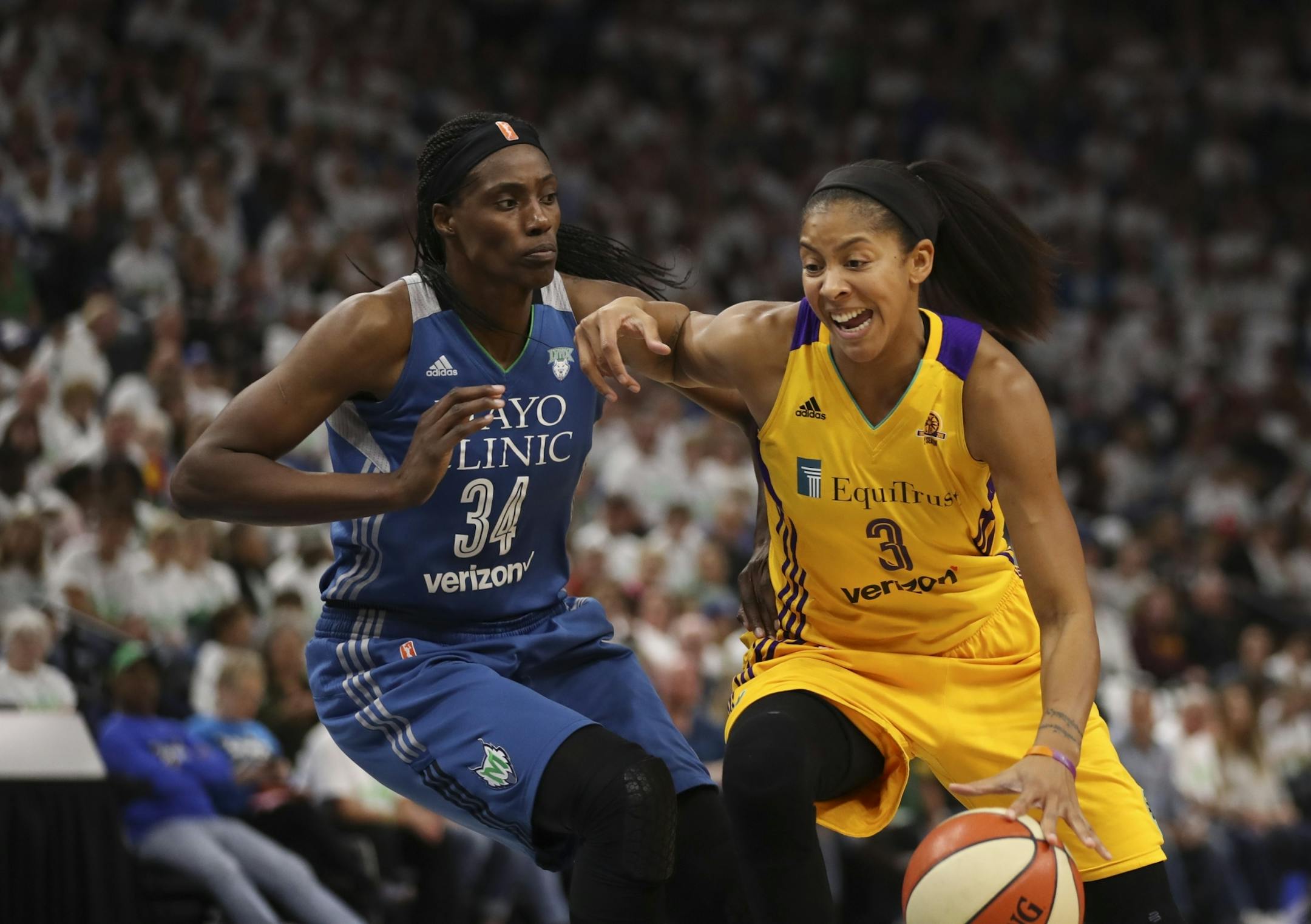 Minnesota Lynx center Sylvia Fowles (34) earned a foul defending Los Angeles Sparks forward Candace Parker (3) in the second quarter.