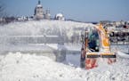 A city of St. Paul snow crew removed snow from the Smith Avenue Bridge, Friday, February 8, 2019 in St. Paul, MN.