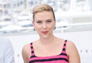 FILE - Scarlett Johansson poses for photographers at the photo call for the film "Asteroid City" at the 76th international film festival, Cannes, sout