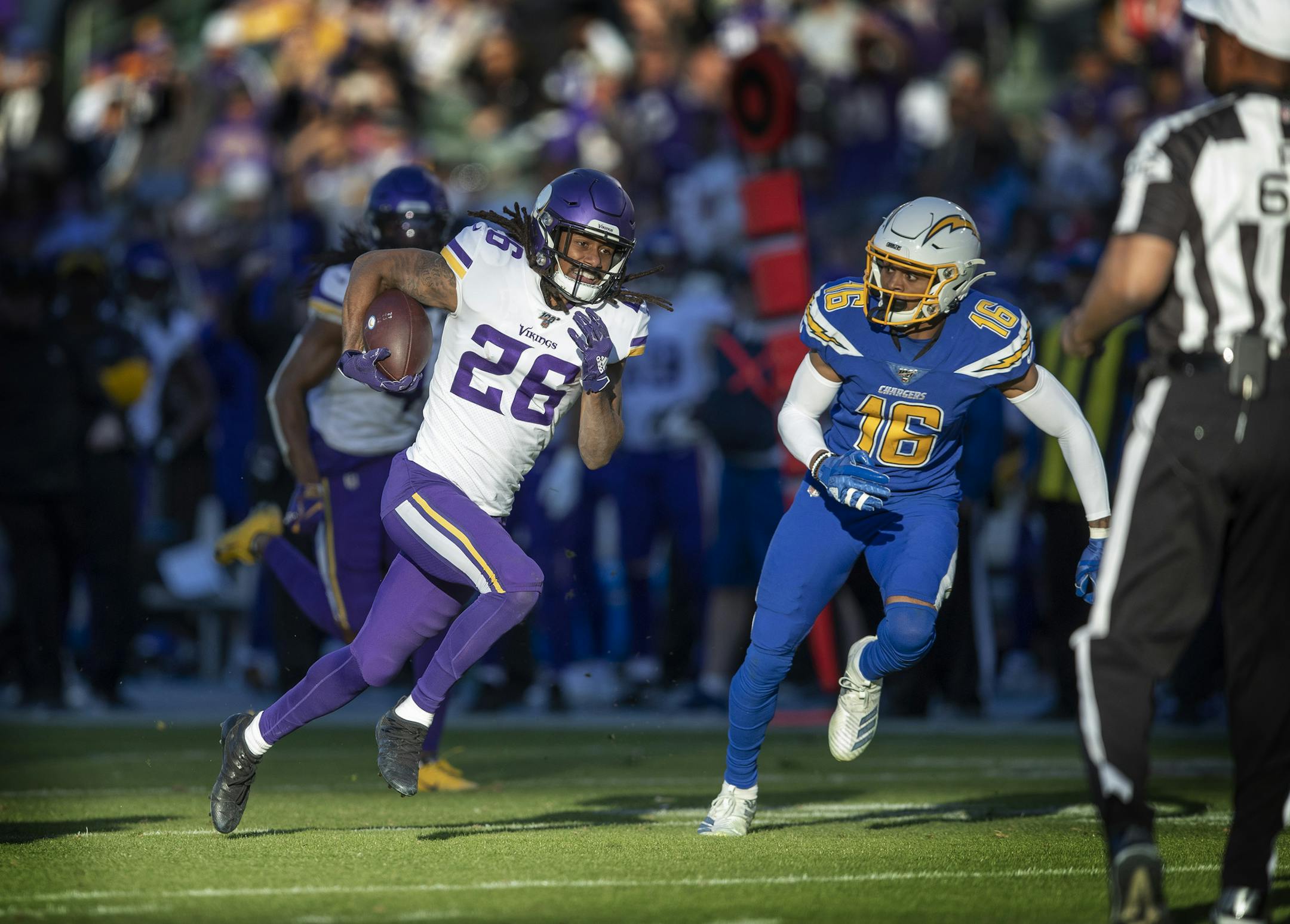 Los Angeles Chargers wide receiver Andre Patton (16) chased Minnesota Vikings cornerback Trae Waynes (26) after he intercepted a pass in the fourth quarter .] Jerry Holt • Jerry.Holt@startribune.com The Minnesota Vikings defeated the Los Angeles Chargers 39-10 in an NFL football game Sunday , December 15, 2019 at Dignity Health Sports Park in Carson, CA.