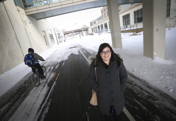 Hennepin County has hired a new bicycle and pedestrian coordinator Kelley Yemen who posed for a photo on the Greenway in Minneapolis, Minn., on Monday