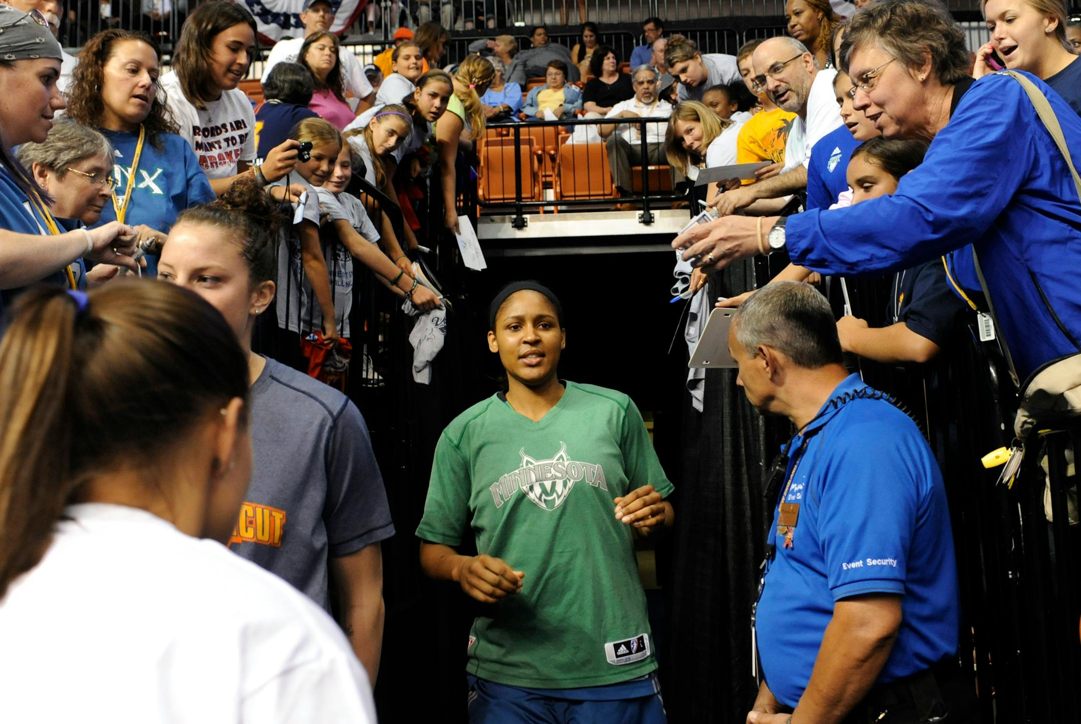 Fans reached out to the Lynx' Maya Moore before Tuesday night's WNBA game against the Connecticut Sun in Uncasville, Conn. Moore, a former UConn Huskies star, was held to two points on 1-for-7 shooting.