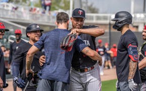 Jhoan Duran greeted teammates at spring training in February.
