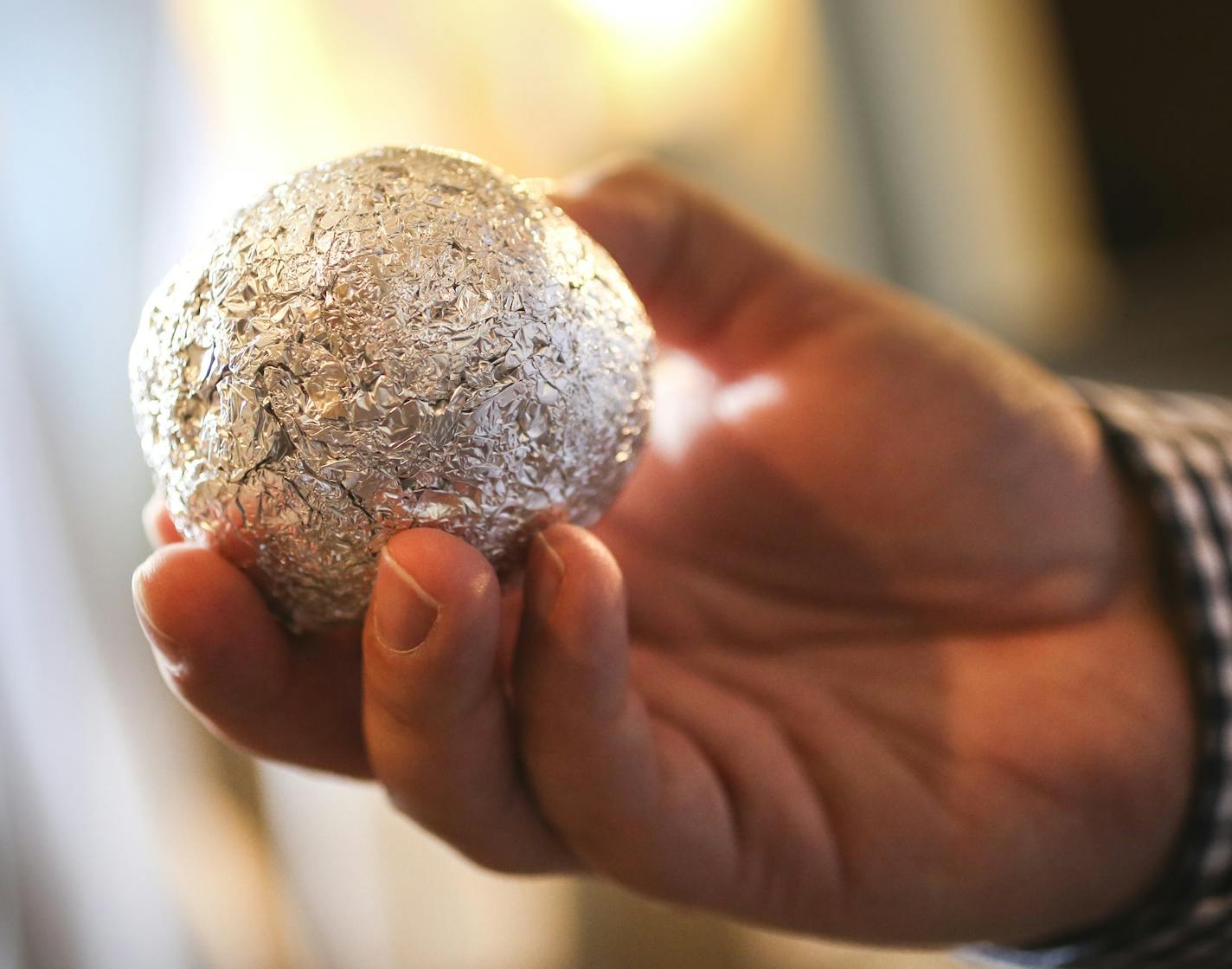 Patric Richardson uses a tin foil ball instead of dryer sheets when he does his laundry. Photographed in St. Paul, Minn., on Monday, March 30, 2015. ] RENEE JONES SCHNEIDER &#x2022; reneejones@startribune.com