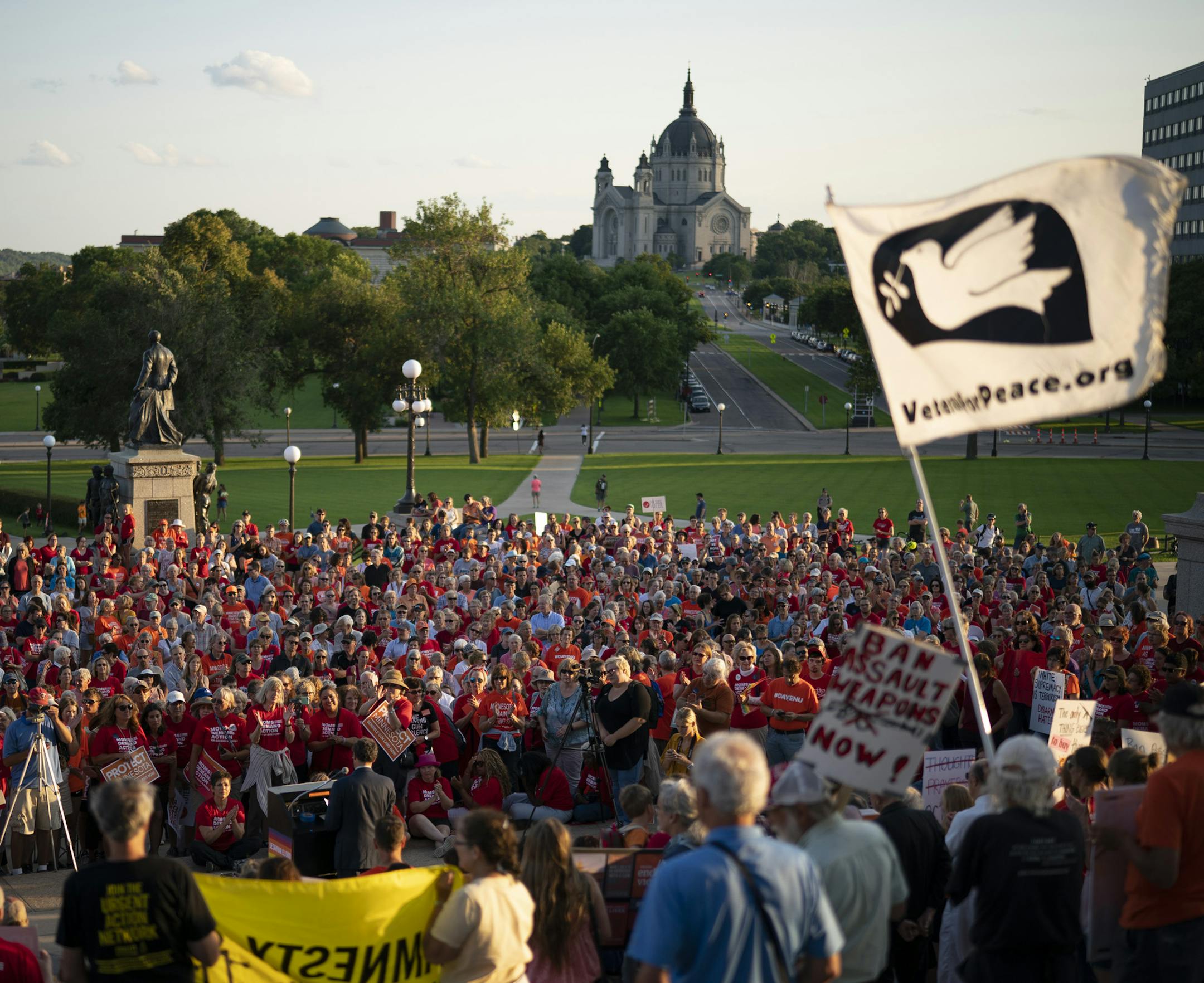 A crowd on the steps of the Minnesota State Capitol listened to a speaker as they gathered for a rally against gun violence earlier in August where Gov. Tim Walz spoke.