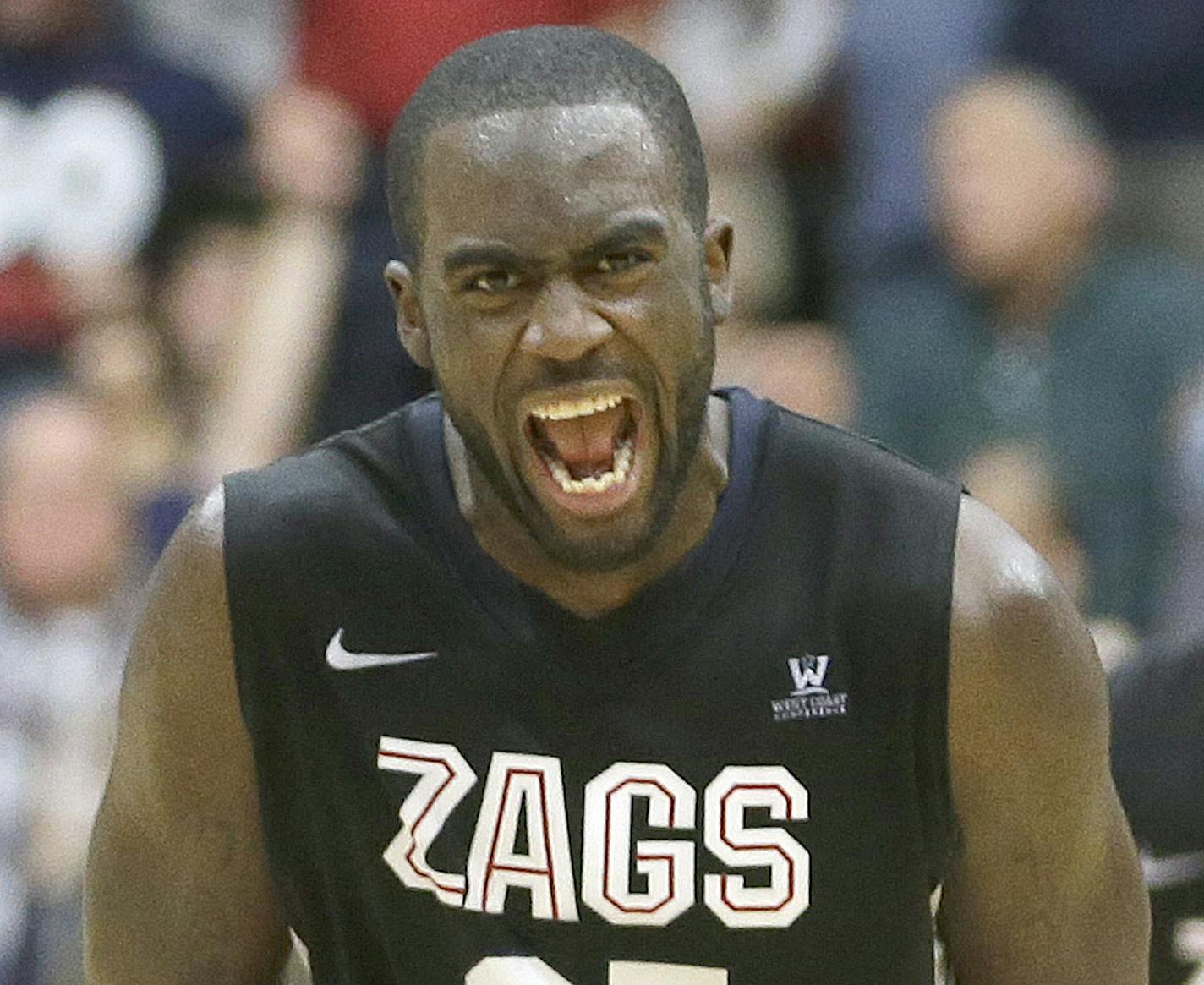 Gonzaga's Sam Dower (35) reacts after making a shot in the final seconds against Santa Clara in the second half of an NCAA college basketball game Wednesday, Jan. 29, 2014, in Santa Clara, Calif. Gonzaga won 54-52. (AP Photo/Tony Avelar) ORG XMIT: CATA114