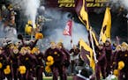 The Gophers, led by head coach P.J. Fleck, took the field before Saturday night's game against Nebraska.