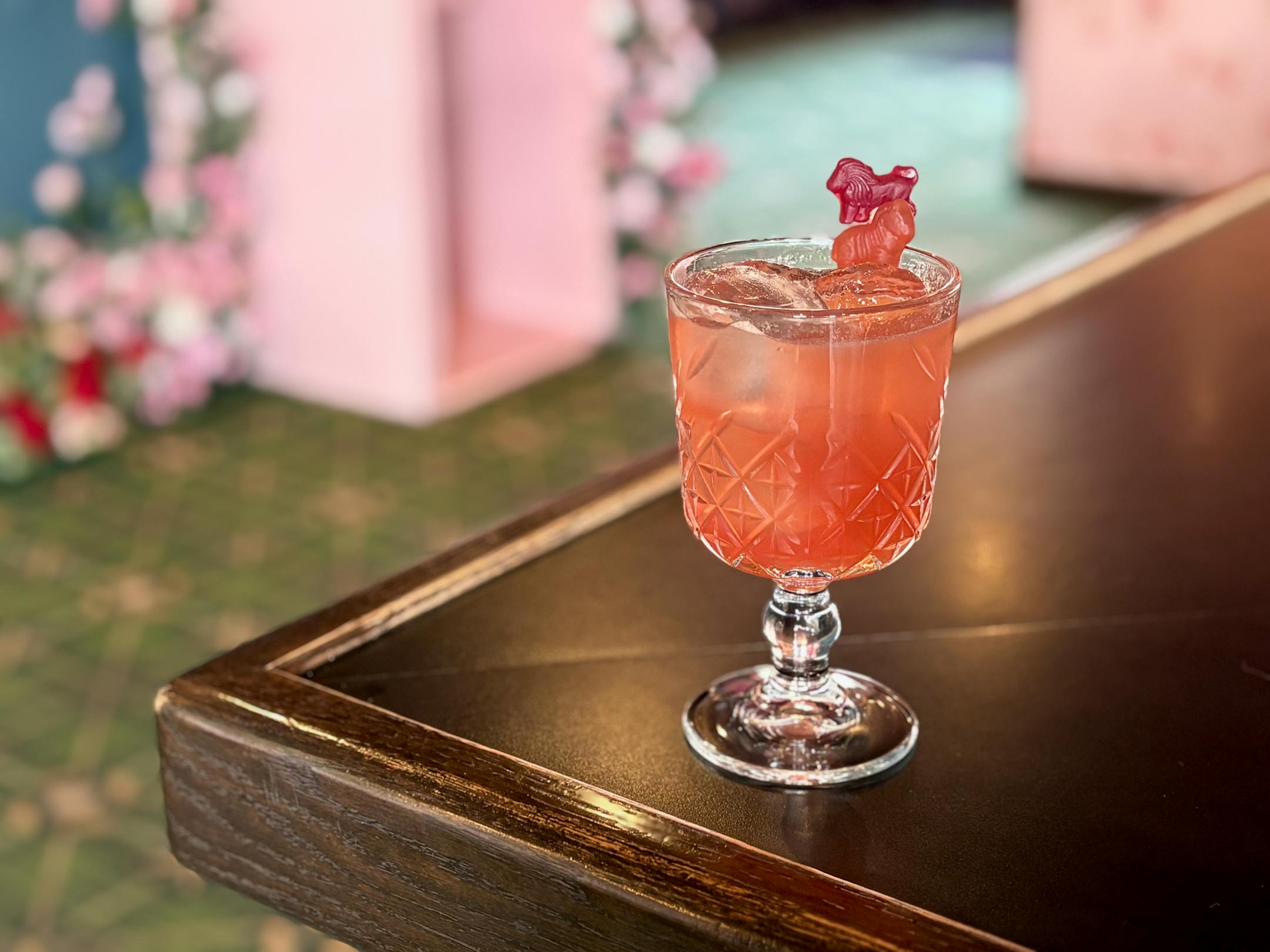 A pink cocktail on the bar of the forthcoming Hey Ya'll.