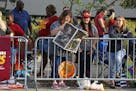 Cleveland Cavaliers fans gather across the street from the Quicken Loans Arena early Wednesday, June 22, 2016, to watch a parade celebrating the Caval