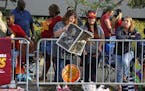 Cleveland Cavaliers fans gather across the street from the Quicken Loans Arena early Wednesday, June 22, 2016, to watch a parade celebrating the Caval