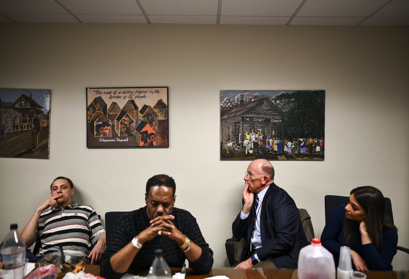 DOC commissioner Paul Schnell, right of center, listened to former inmates discuss their experiences with corrections Tuesday night at a Power of People Institute meeting. To his left are former inmates Daniel Shepard and Philip Holmes and to his right, DOC Government Relations Director Safia Khan. ] Aaron Lavinsky &#xa5; aaron.lavinsky@startribune.com DOC Commissioner Paul Schnell is pushing for a five-member release review board to determine the fate of inmates with life sentences. Schnell met