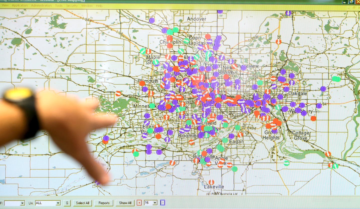 iHail is a new consortium of cab companies joining together under Taxi Services Inc. to combat the ride-sharing economy, including global giant, Uber. Here, via a video screen, the status of all the company's taxis are monitored Thursday, Aug. 6, 2014, in New Hope, MN.](DAVID JOLES/STARTRIBUNE)djoles@startribune.com iHail is a new consortium of cab companies joining together under Taxi Services Inc. to combat the ride-sharing economy, including global giant, Uber.