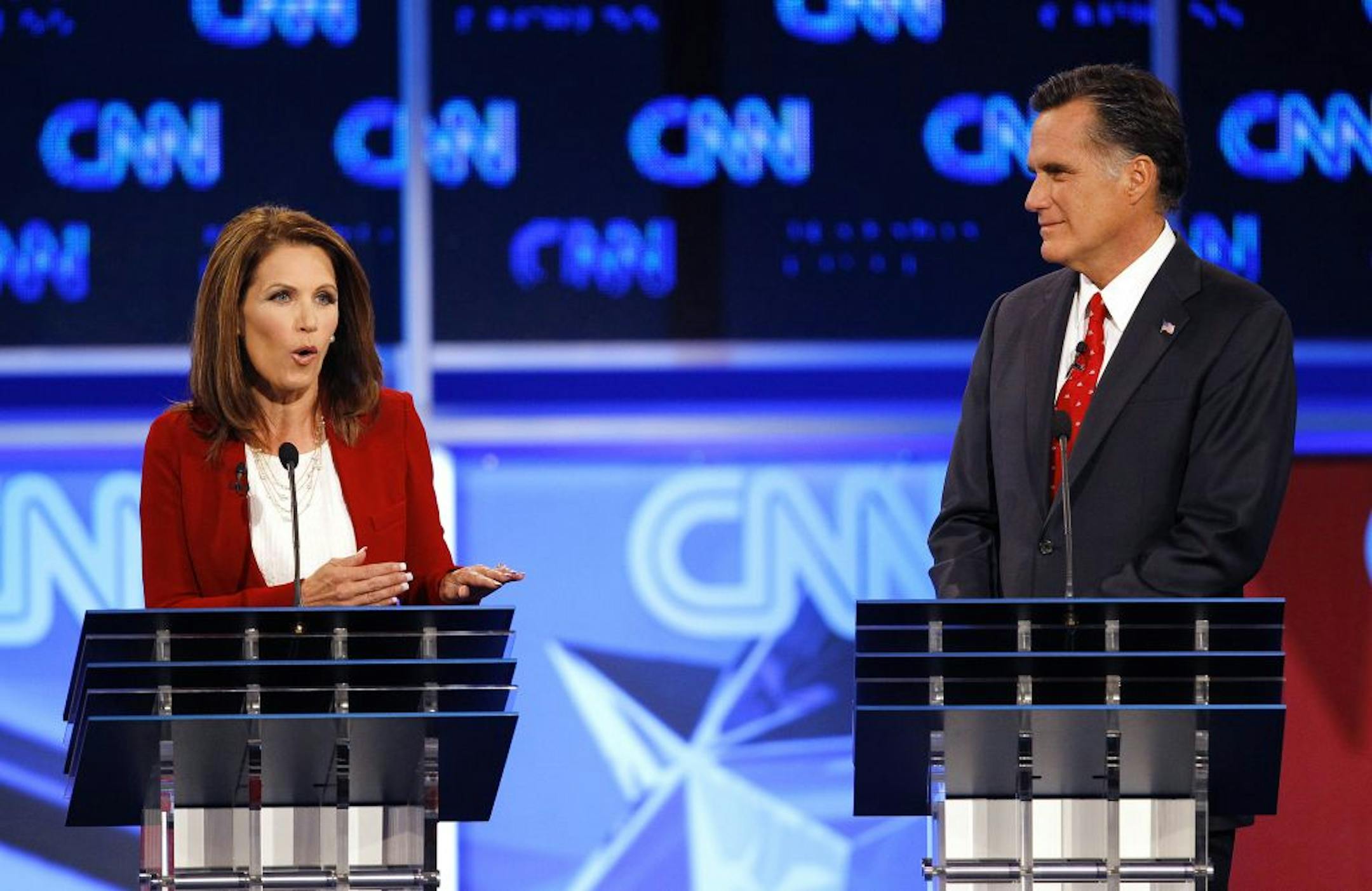 FILE -- Rep. Michele Bachmann, R-Minn, left, has endorsed Mitt Romney, her one-time rival for the GOP presidential nomination. Here, they faced off in a debate in Tampa, Fla., earlier in the contest.
