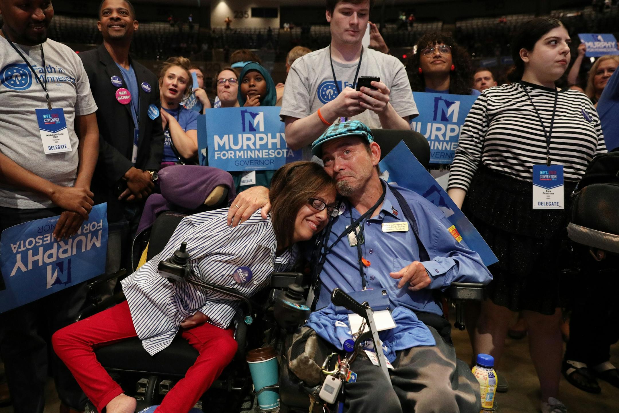 Nikki Villavicencio and Darrell Paulsen celebrated as gubernatorial candidate Erin Murphy spoke to the convention after she secured the party endorsement during the DFL State Convention Saturday.