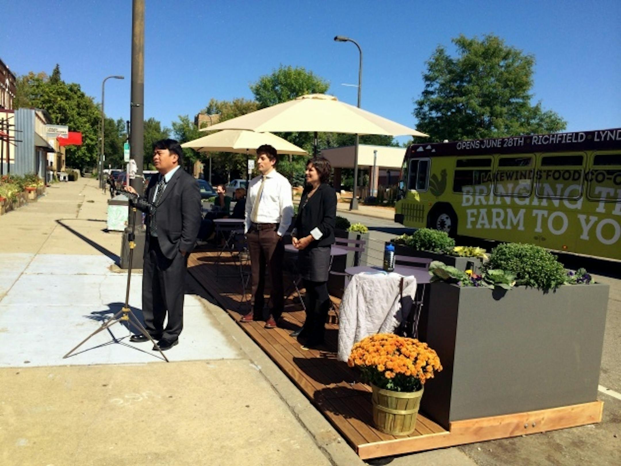 Council Members Blong Yang, Jacob Frey and Lisa Bender marked the debut of the city's first portable parks at 2007 Emerson Ave. N., one of three of the "parklet" locations.