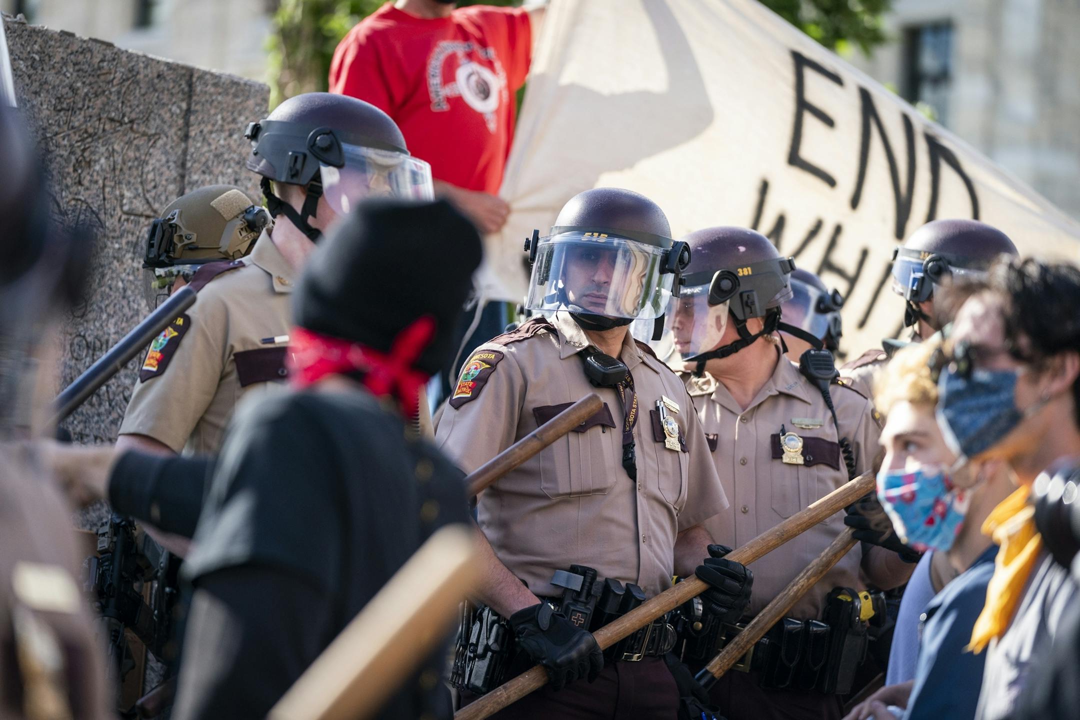 Minnesota State Troopers surrounded the statue after it was toppled, until it could be taken away by a tow truck.