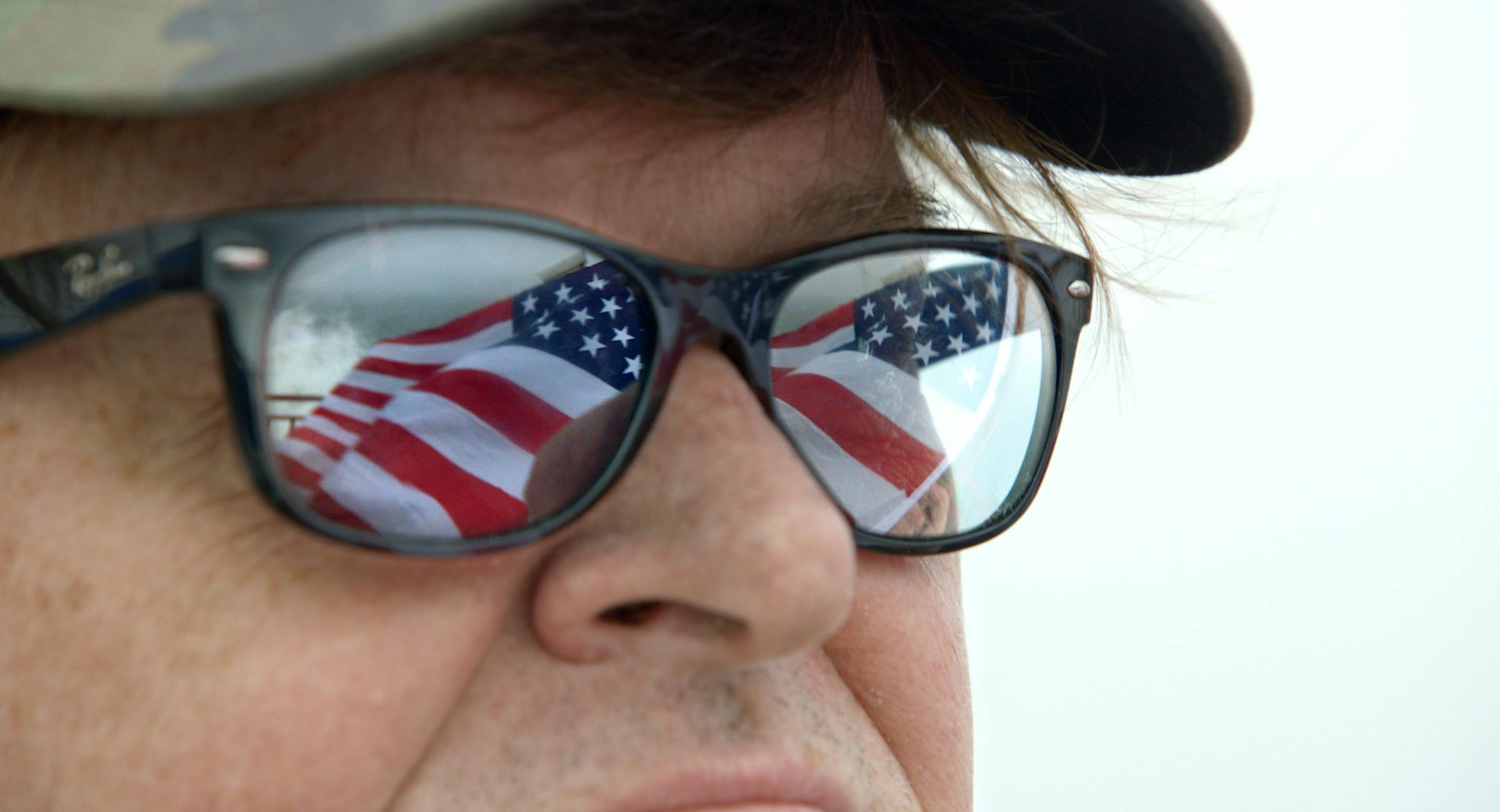 This image provided by Dog Eat Dog Films shows director Michael Moore in a scene from his documentary, "Where to Invade Next." The movie opens in U.S. theaters on Feb. 12, 2016. (Dog Eat Dog Films via AP)