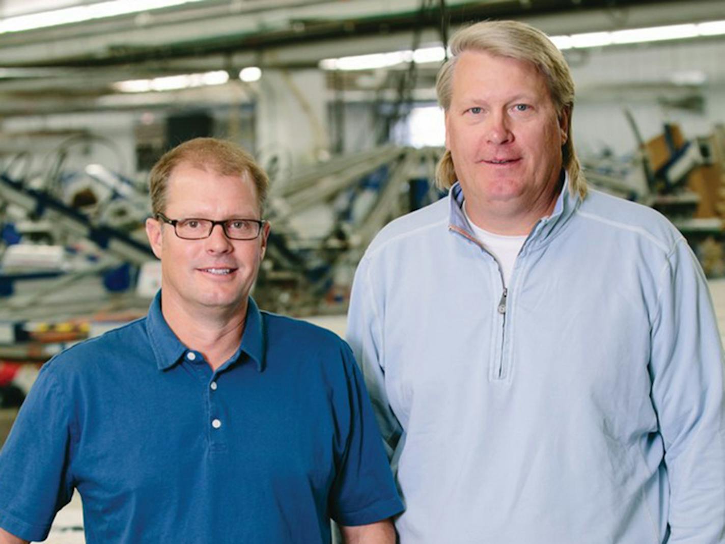 Lakeshirts/Blue 84, started in 1984, makes branded T-shirts, sweatshirts and other merchandise for vacation resorts and colleges around the country, with Mark Fritz, left, and Mike Hutchinson still co-CEOs.