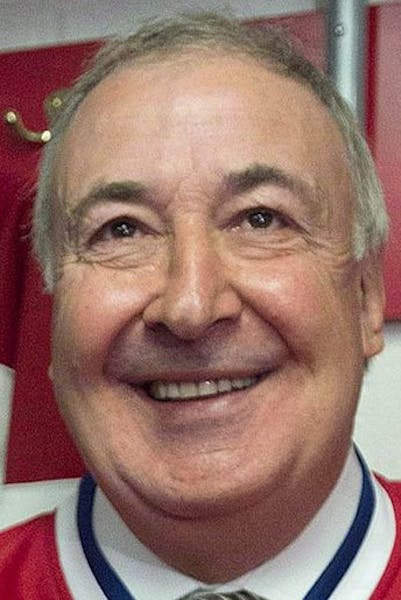 FILE - In this June 19, 2014, file photo, Montreal Canadiens great Guy Lapointe smiles at the Canadiens Hall of Fame in Montreal. Lapointe's jersey re