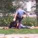 A video posted on YouTube.com showed an officer kicking Eric R. Hightower.