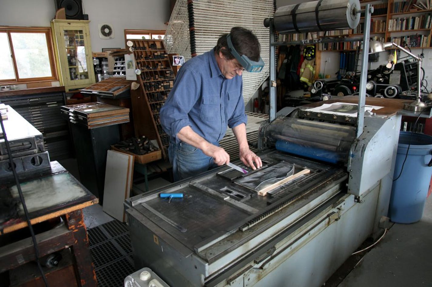 Gaylord Schanilec worked on fish illustrations in his studio.