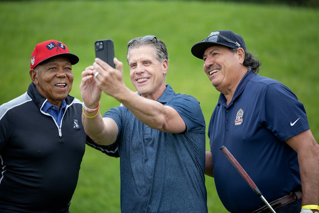 Randy Shaver, center, grabbed a selfie with former Minnesota Twins stars Tony Oliva, left, and Juan Berenguer, right, during his golf fundraiser at the Rush Creek Country Club in June.