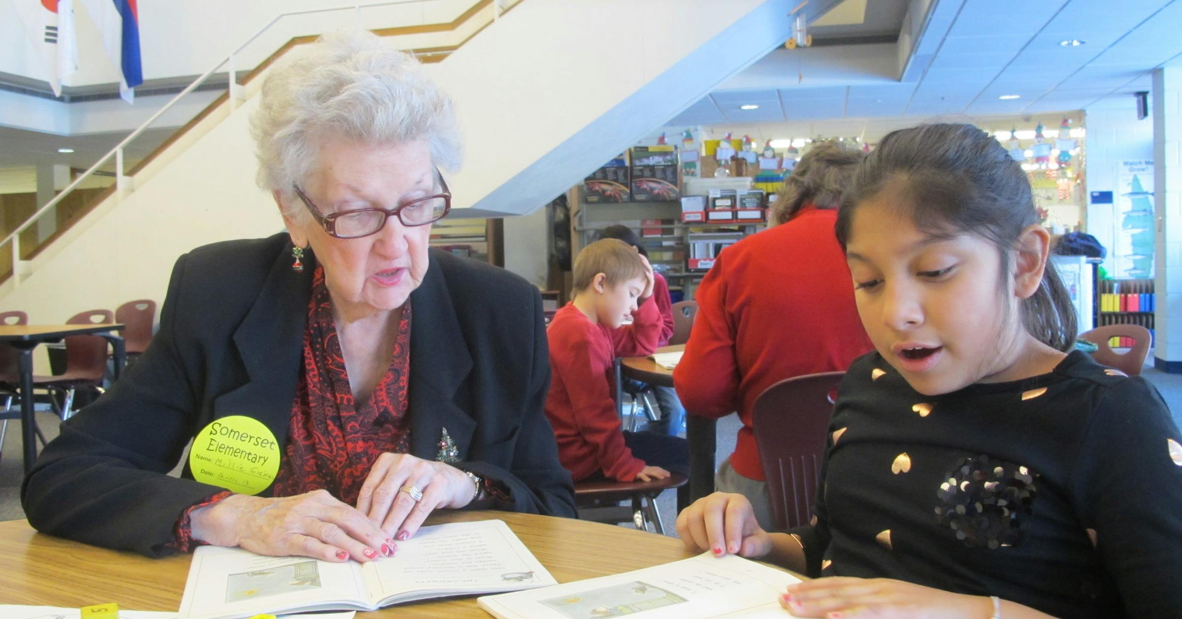 Pupils pair with adults for a two-way-learning experience