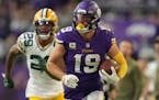 Minnesota Vikings wide receiver Adam Thielen (19) sprinted towards the end zone after he caught a pass from quarterback Kirk Cousins late in the fourt