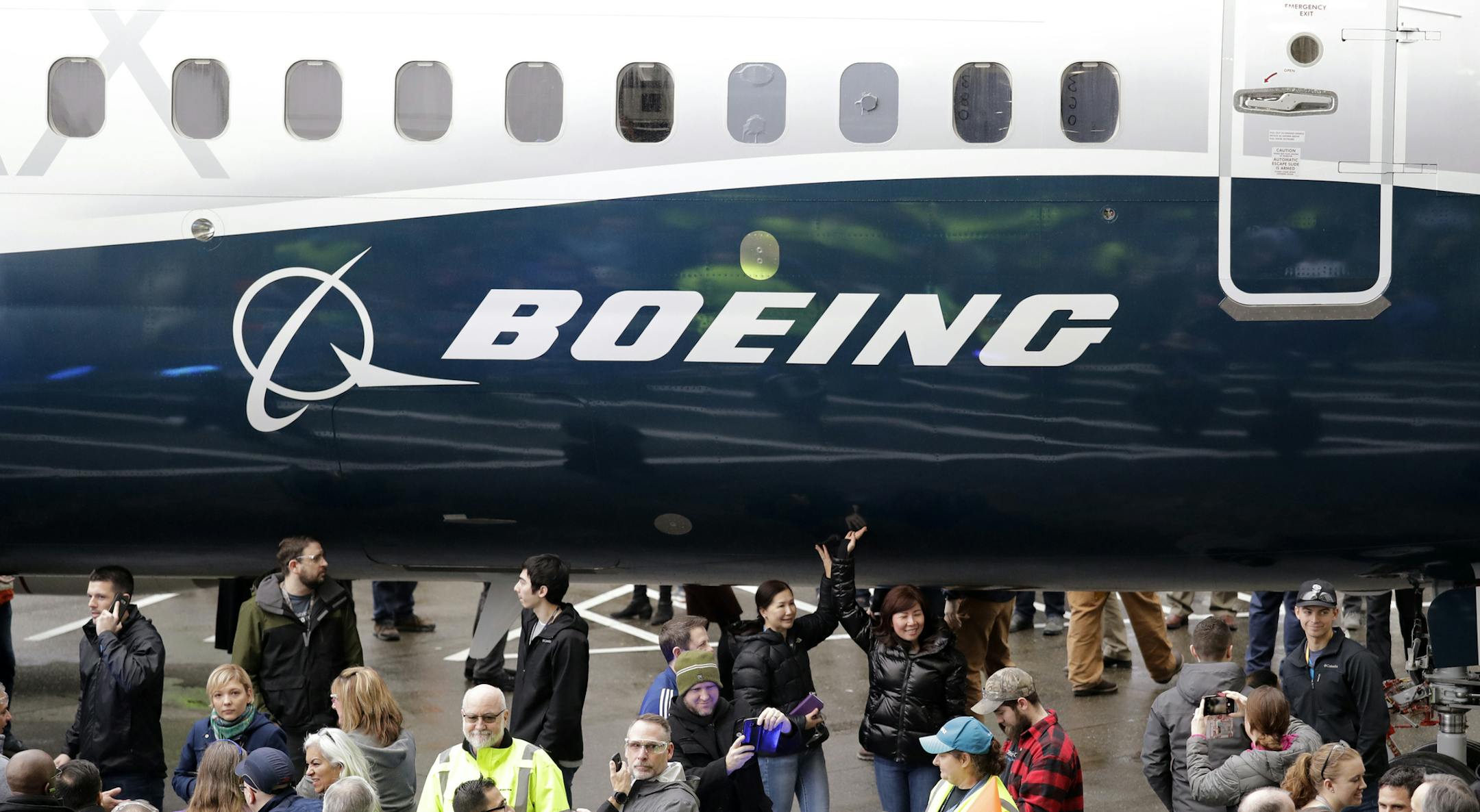 FILE- In this Feb. 5, 2018, file photo a Boeing 737 MAX 7, the newest version of Boeing's fastest-selling airplane, is displayed during a debut for employees and media of the new jet in Renton, Wash. The Boeing Company reports earnings Wednesday, Jan. 30, 2019. (AP Photo/Elaine Thompson, File)