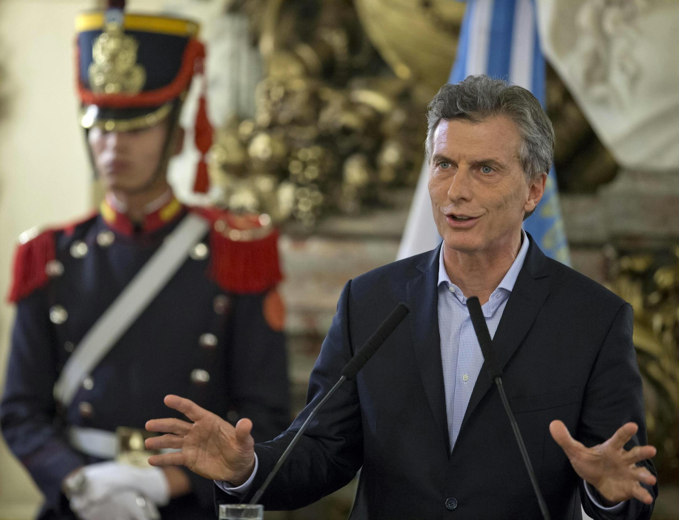 Argentina's President Mauricio Macri gives a statement at the government house in Buenos Aires, Argentina, Thursday, April 7, 2016. An Argentine prosecutor on Thursday asked for an investigation into President Mauricio Macri's role in offshore companies, adding to the global fallout from a massive leak of documents from a Panama law firm. (AP Photo/Natacha Pisarenko)