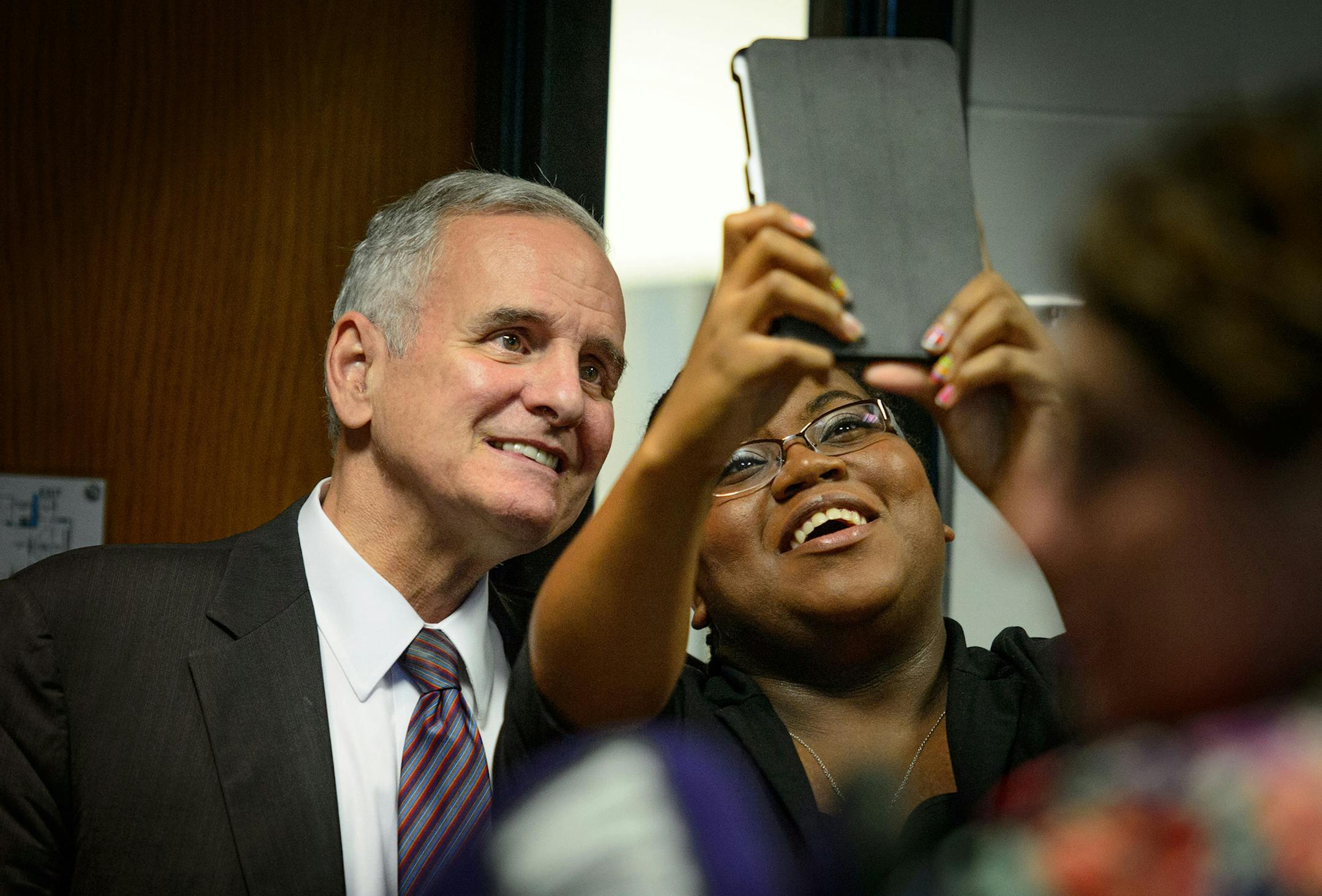 Governor Mark Dayton took time to pose for a selfie after meeting with Winona State University student senators at the Kryzsko Commons Student Union, Winona. ] Wednesday September 9, 2014 GLEN STUBBE * gstubbe@startribune.com EDS, no ID ORG XMIT: MIN1409161526372046