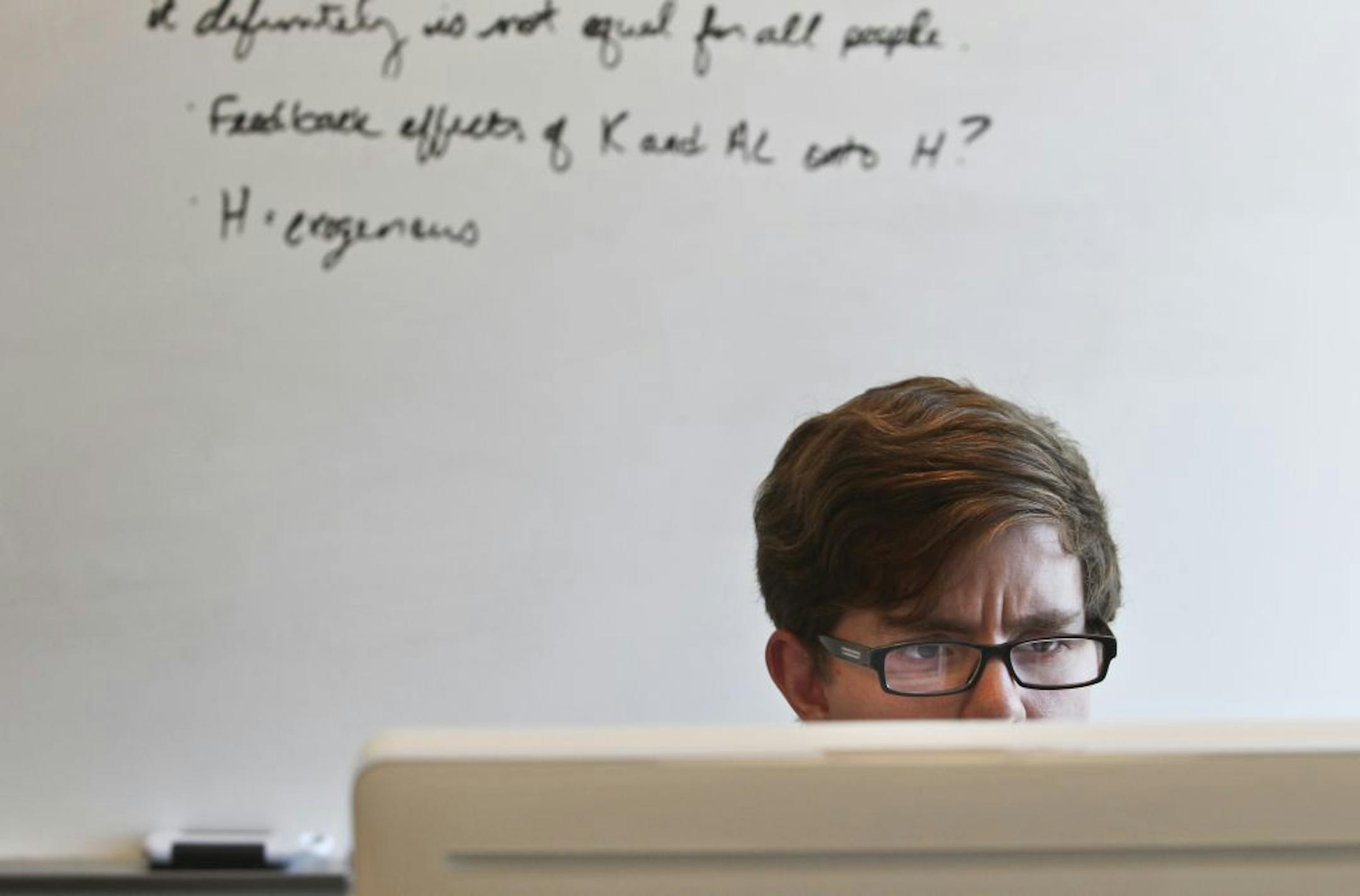 Zachary Hanson, 21, will soon graduate from the University of Minnesota with a major in economics and political science. He was seen at Hanson Hall, working on finding countrywide educational data in Minneapolis, MN, Wednesday, May 2, 2012.