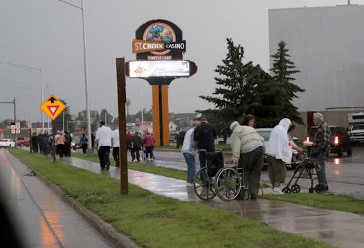 Patrons and employees at St. Croix Casino in Turtle Lake, Wis., evacuated the building after a strong afternoon thunderstorm moved through Friday. 