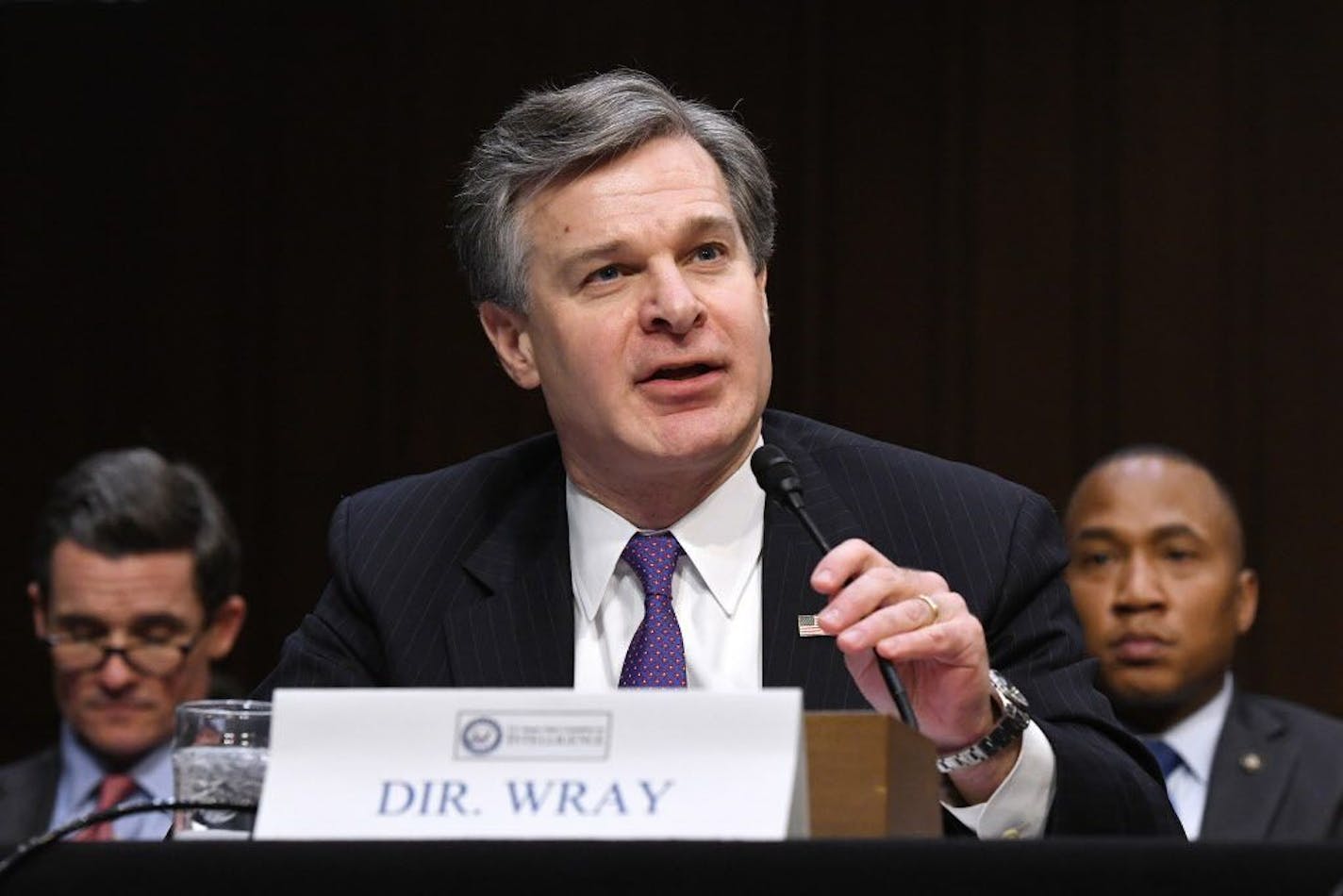 FBI Director Christopher Wray, joined by top intelligence officials, including Director of National Intelligence Dan Coats, CIA Director Mike Pompeo, National Security Agency Director Mike Rogers, Defense Intelligence Agency Director Robert Ashley and National Geospatial Intelligence Agency Director Robert Cardillo, testifies before the Senate Intelligence Committee for a hearing focusing on global threats on Feb. 13, 2018 in Washington, D.C.