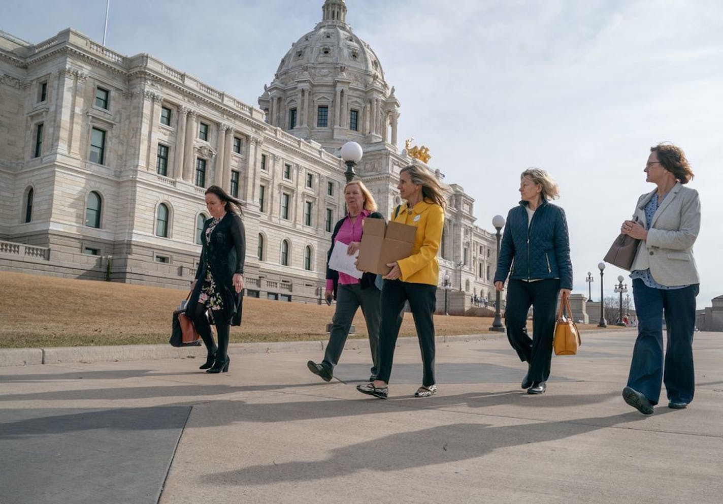 Kristine Sundberg, president of Elder Voice Family Advocates, second from left, led a group of elder care advocates to the State Office Building to meet with legislators. L to R are Jane Overby, Kristine Sundberg, Kay Bromelkamp, Brenda Roth, and Bonnie Wenker.