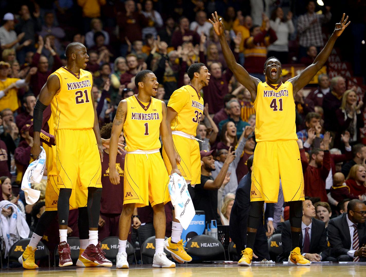 The Minnesota Golden Gophers bench erupted after a 3-point shot made by Minnesota Golden Gophers guard Nate Mason (2) in the second half against the Michigan State Spartans Saturday. ] (AARON LAVINSKY/STAR TRIBUNE) aaron.lavinsky@startribune.com The University of Minnesota Golden Gophers men's basketball team played the Michigan State Spartans on Saturday, Jan. 2, 2016 at Williams Arena in Minneapolis, Minn.