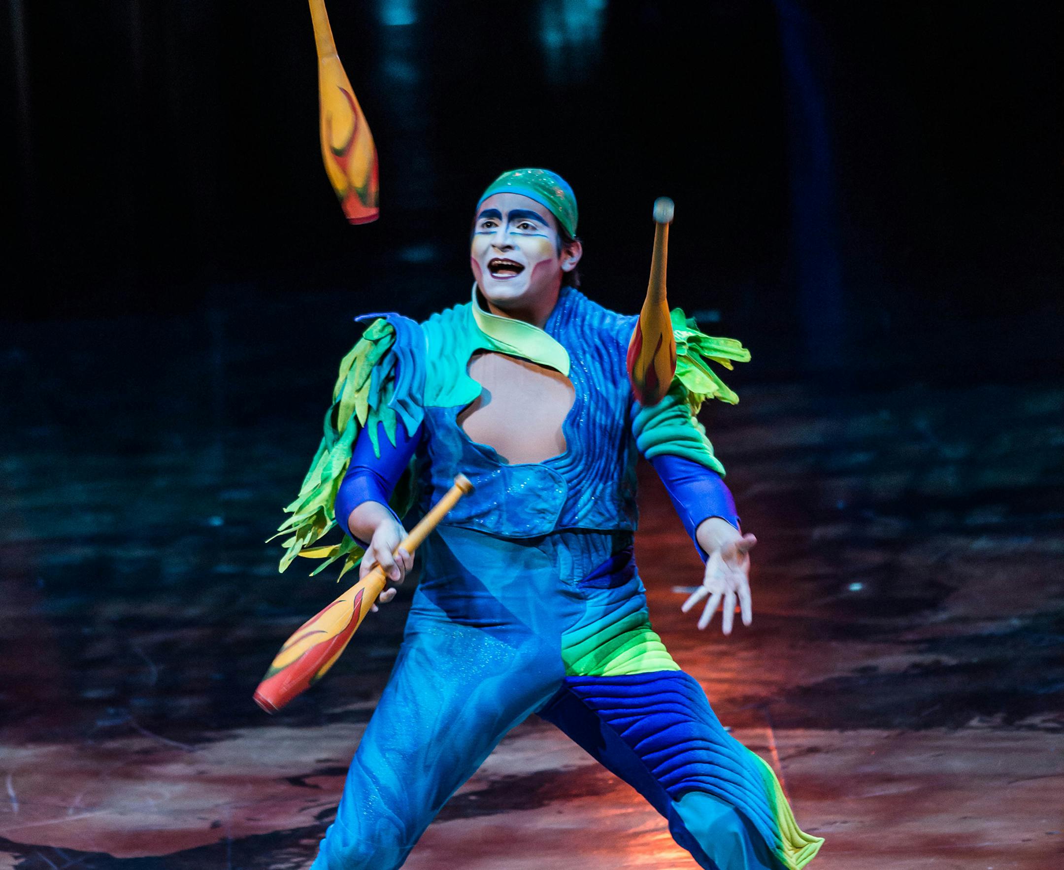 Photo: Martin Girard / shootstudio.ca Juggler Roberto Carbajal manipulates bowling pins, soccer balls, hats and ping-pong balls with his hands, feet, head and even his mouth in "Varekai" by Cirque du Soleil. Costumes: Eiko Ishioka ¬© 2014 Cirque du Soleil