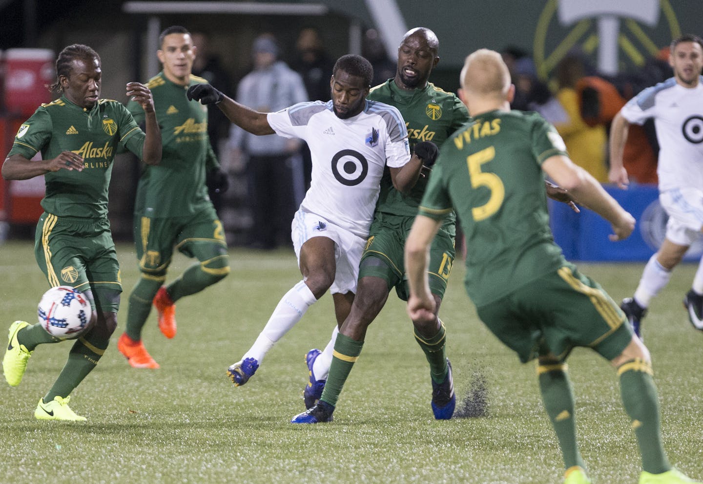 Minnesota United midfielder Kevin Molino (18) passes during the first half of an MLS soccer game against the Portland Timbers in Portland, Ore., Mar. 3, 2017. (AP Photo/Randy L. Rasmussen) ORG XMIT: ORRR101