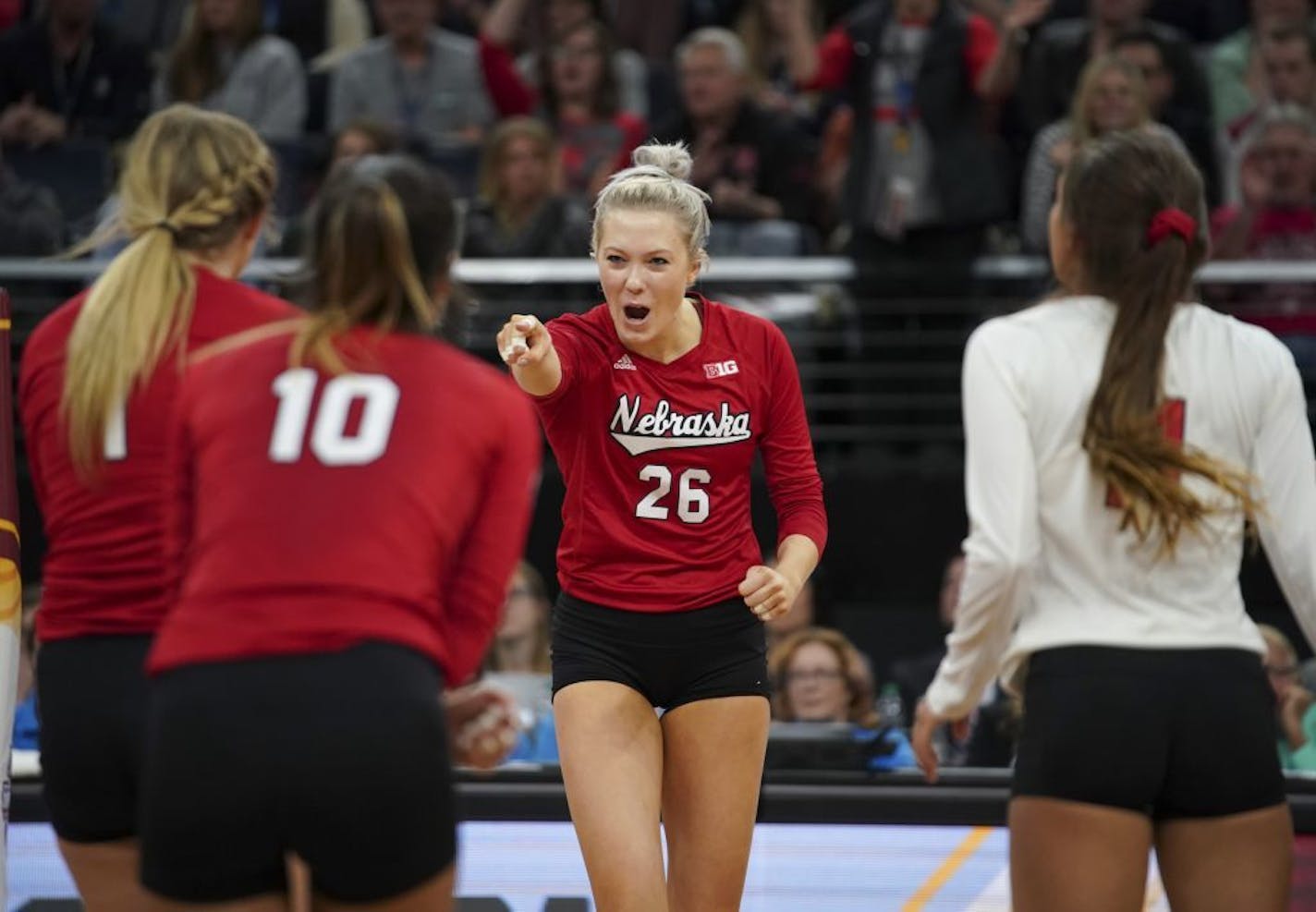 Nebraska's Lauren Stivrins (26) celebrated her point in the final set against Illinois.