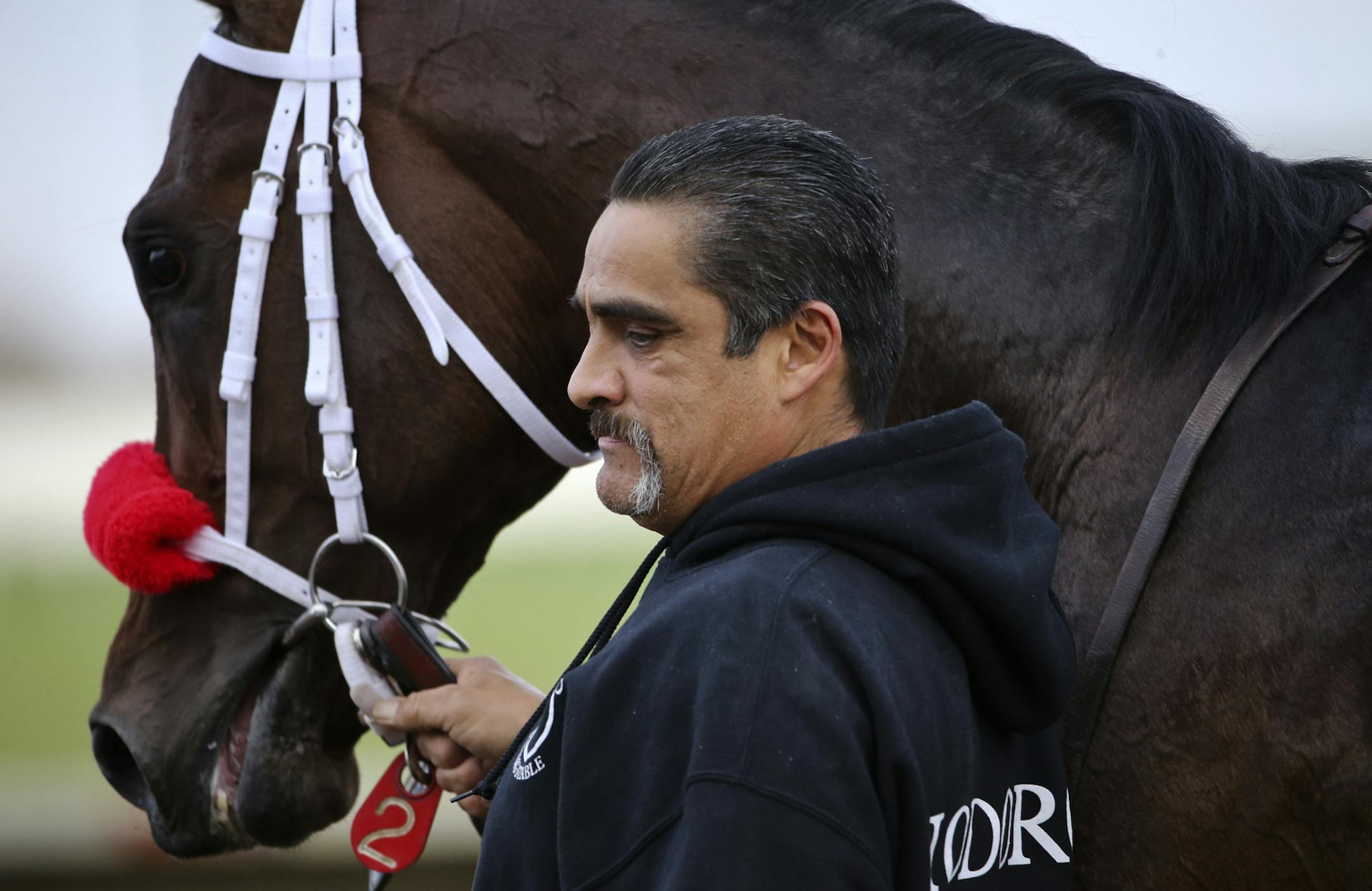 Trainer Robertino Diodoro with the winner of the night's first race Ella's Kitchen during opening night at Canterbury Park Friday, May 16, 2014, in Shakopee, MN.](DAVIDJOLES/STARTRIBUNE) djoles@startribune Opening night at Canterbury Park Friday, May 16, 2014, in Shakopee, MN**Robertino Diodoro,cq