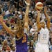 Minnesota Lynx forward Maya Moore (23) lines up a shot against Phoenix Mercury center Brittney Griner (42) in the second half of a WNBA basketball gam