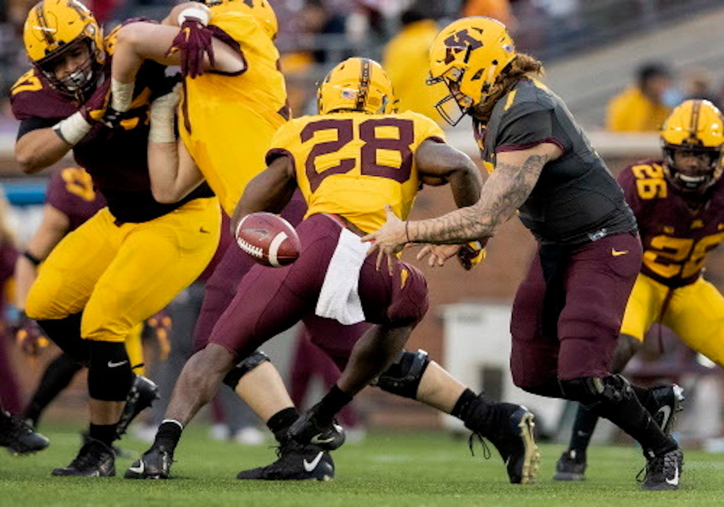 Quarterback Vic Viramontes (7) fumbled the ball during the spring game.