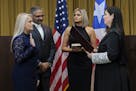 Justice Secretary Wanda Vazquez is sworn in as governor of Puerto Rico by Supreme Court Justice Maite Oronoz, in San Juan, Puerto Rico, Wednesday, Aug