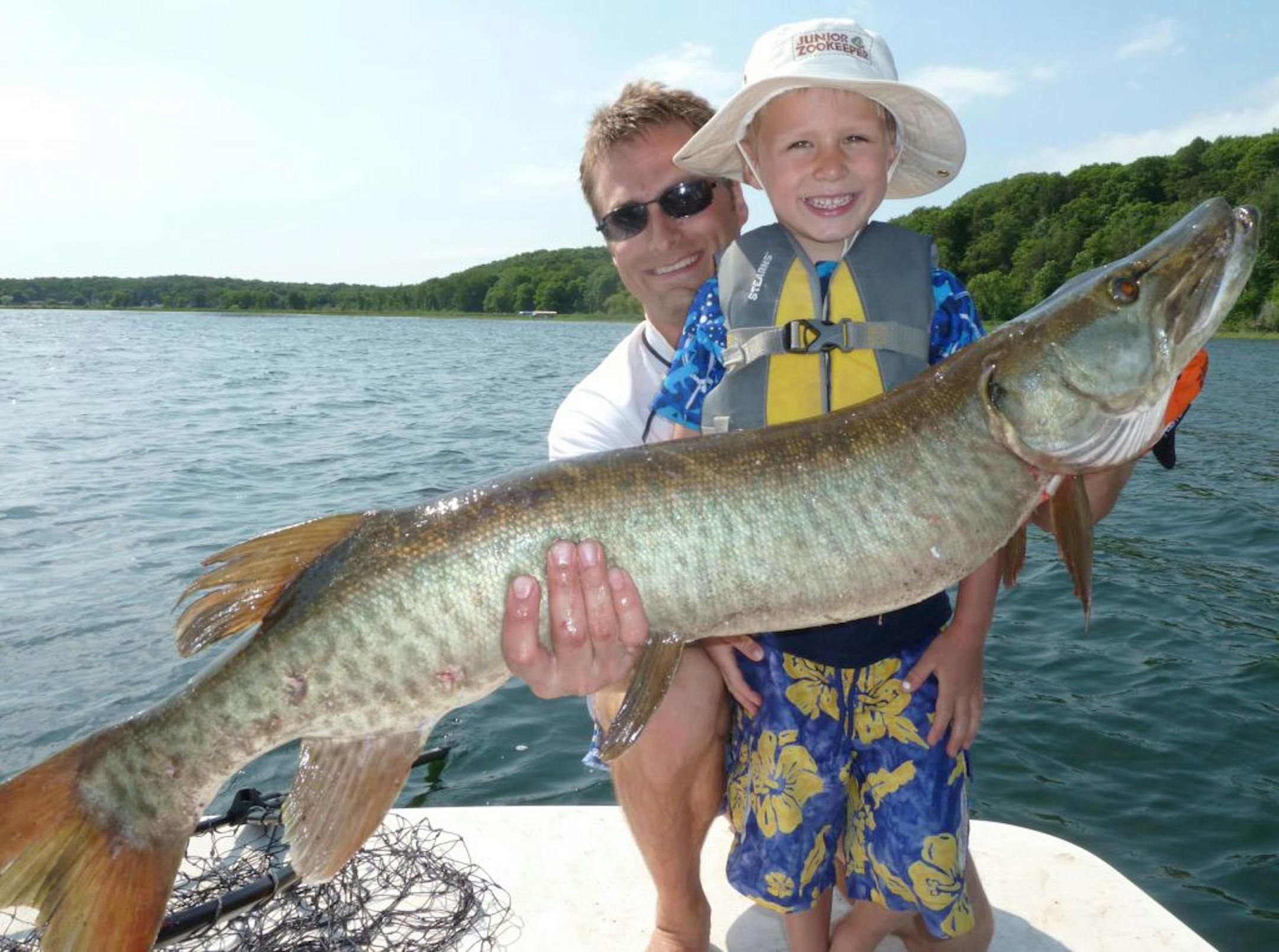 Lachlan Hoffman, 5 and dad, Nathan Hoffman, of Eden Prairie, with a 43-inch muskie they caught and released in the Brainerd Lakes area.