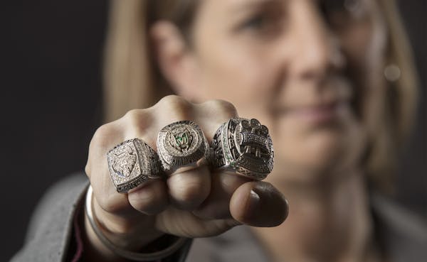 Lynx head coach Cheryl Reeve showed the three championship rings that her team has won.