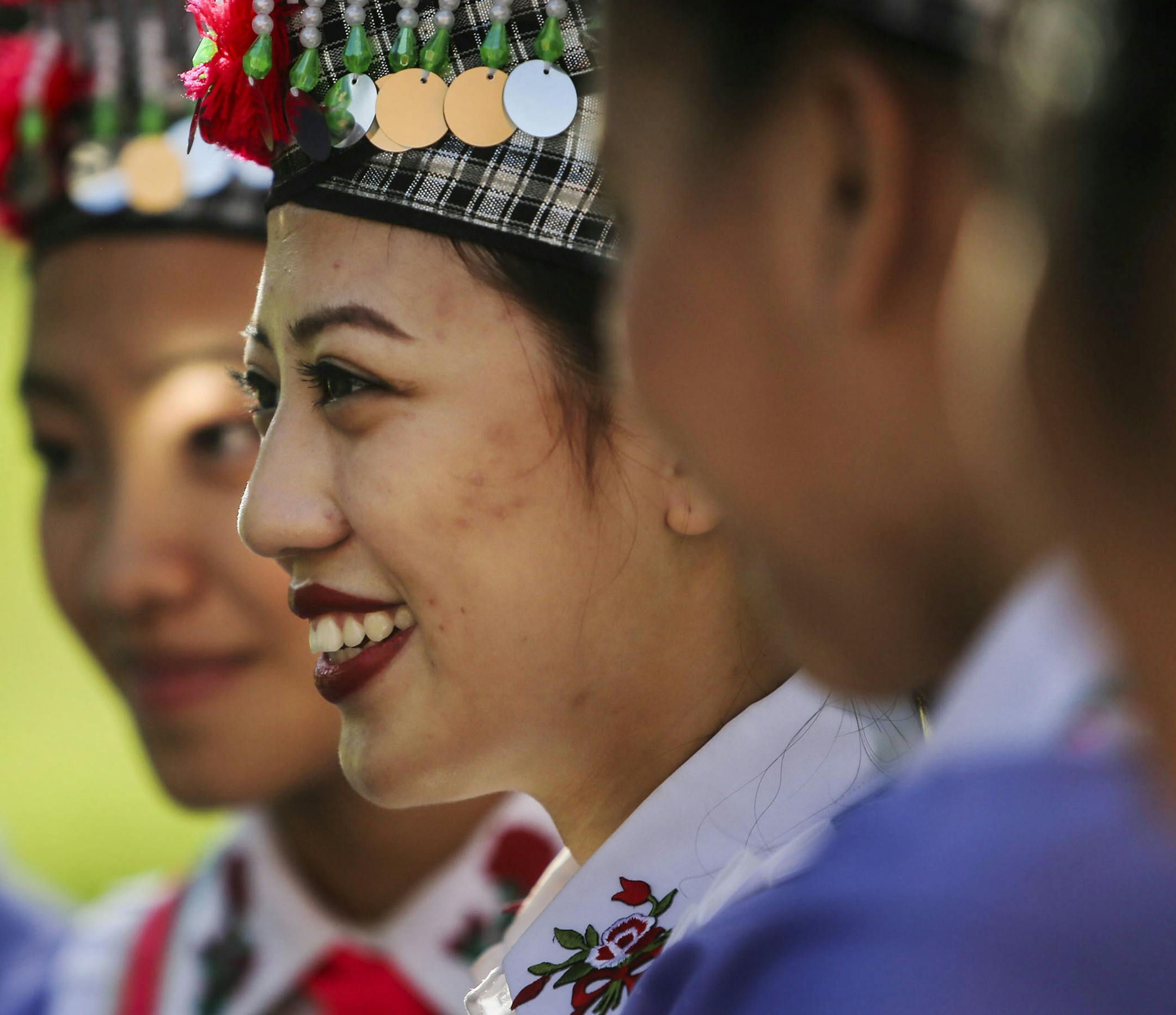 Kou Moua was among a group of traditional Hmong dancers who posed for a photo before taking part in the parade. Twin Cities weather proved ideal for the event.