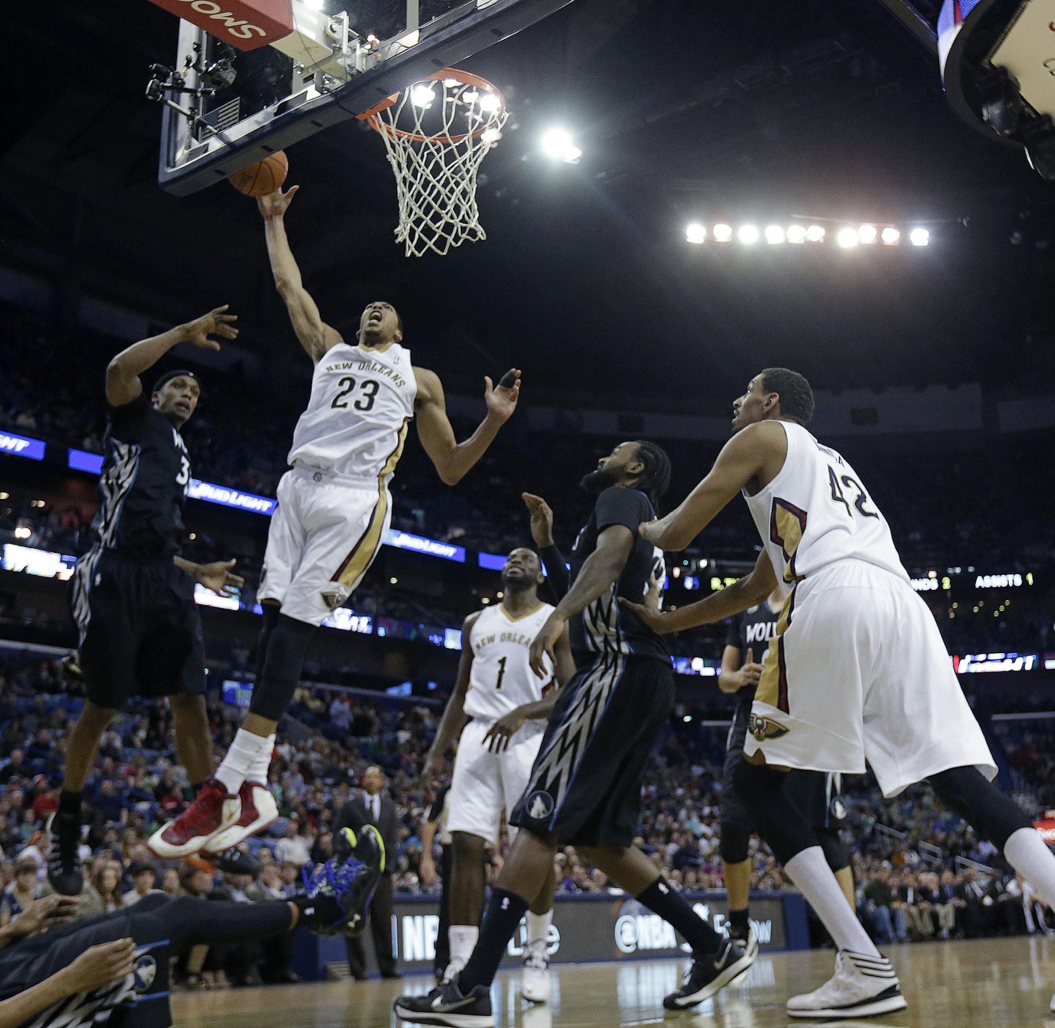 New Orleans Pelicans power forward Anthony Davis (23) goes to the basket in the first half of an NBA basketball game against the Minnesota Timberwolves in New Orleans, Friday, Feb. 7, 2014. (AP Photo/Gerald Herbert)