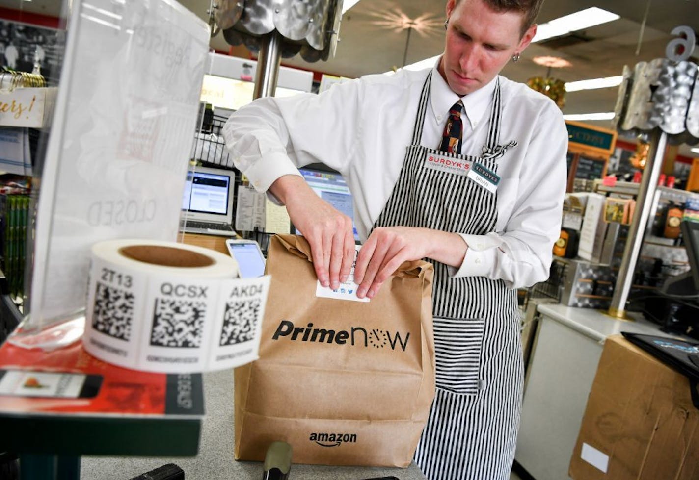 Brian Krause, delivery manager for Surdyk's said they have prepared over 200 deliveries on their first full day of offering two hour service through Amazon Prime.