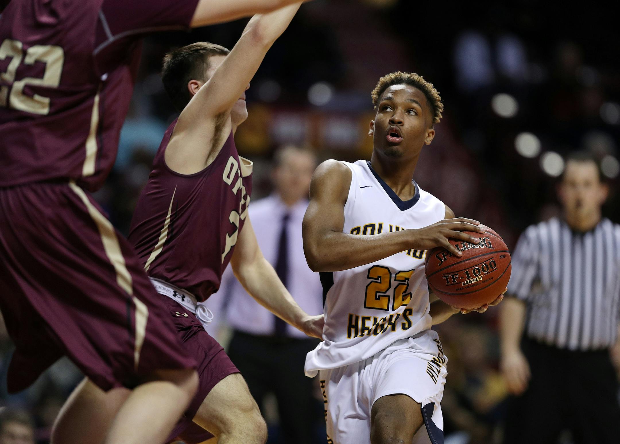 Columbia Heights' Airreon Austin (22) drove to the basket around Fergus Falls' Nathan Rund (3) in the first half. ] ANTHONY SOUFFLE &#xef; anthony.souffle@startribune.com Players competed during the boys' basketball state tournament Class 3A quarterfinal games Wednesday, March 22, 2017 at Williams Arena on the grounds of the University of Minnesota in Minneapolis.